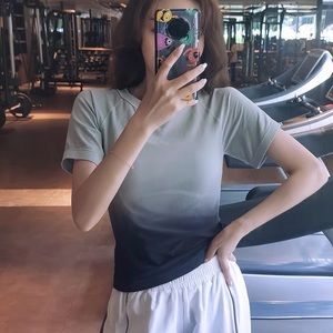 Brand new with tag grey gradient short sleeve work out top Size M